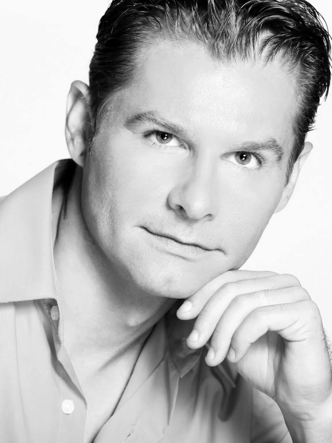 Black and white professional studio headshot of Jerry Lobrow